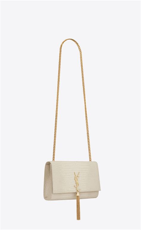 kate medium tassel in crocodile